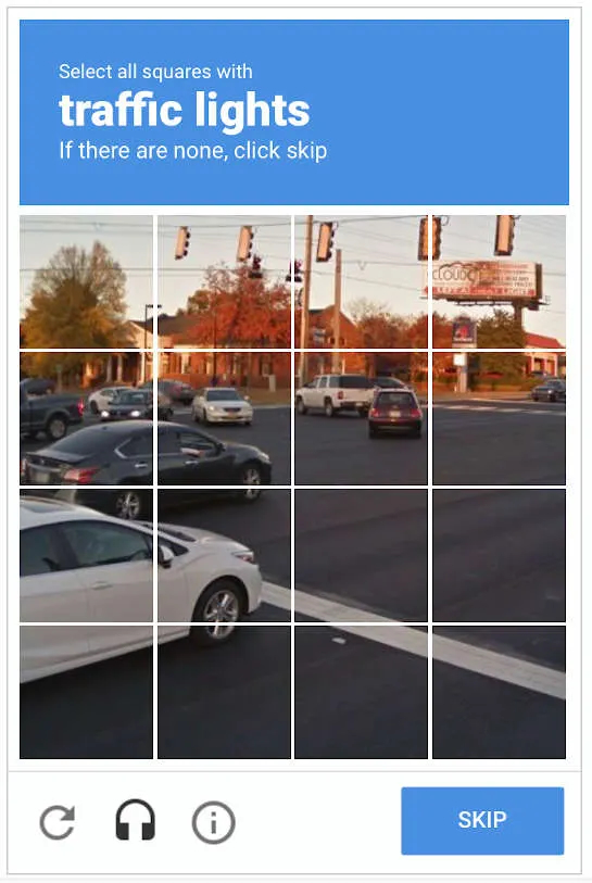 A screenshot of a Google captcha telling the user to select all the squares in the image that contain traffic lights.